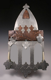 Anti-war Mirror (Steel, Copper, Bronze, Mirror, Beeswax Candles) featured in a talk at the Yuma Symposium 2004